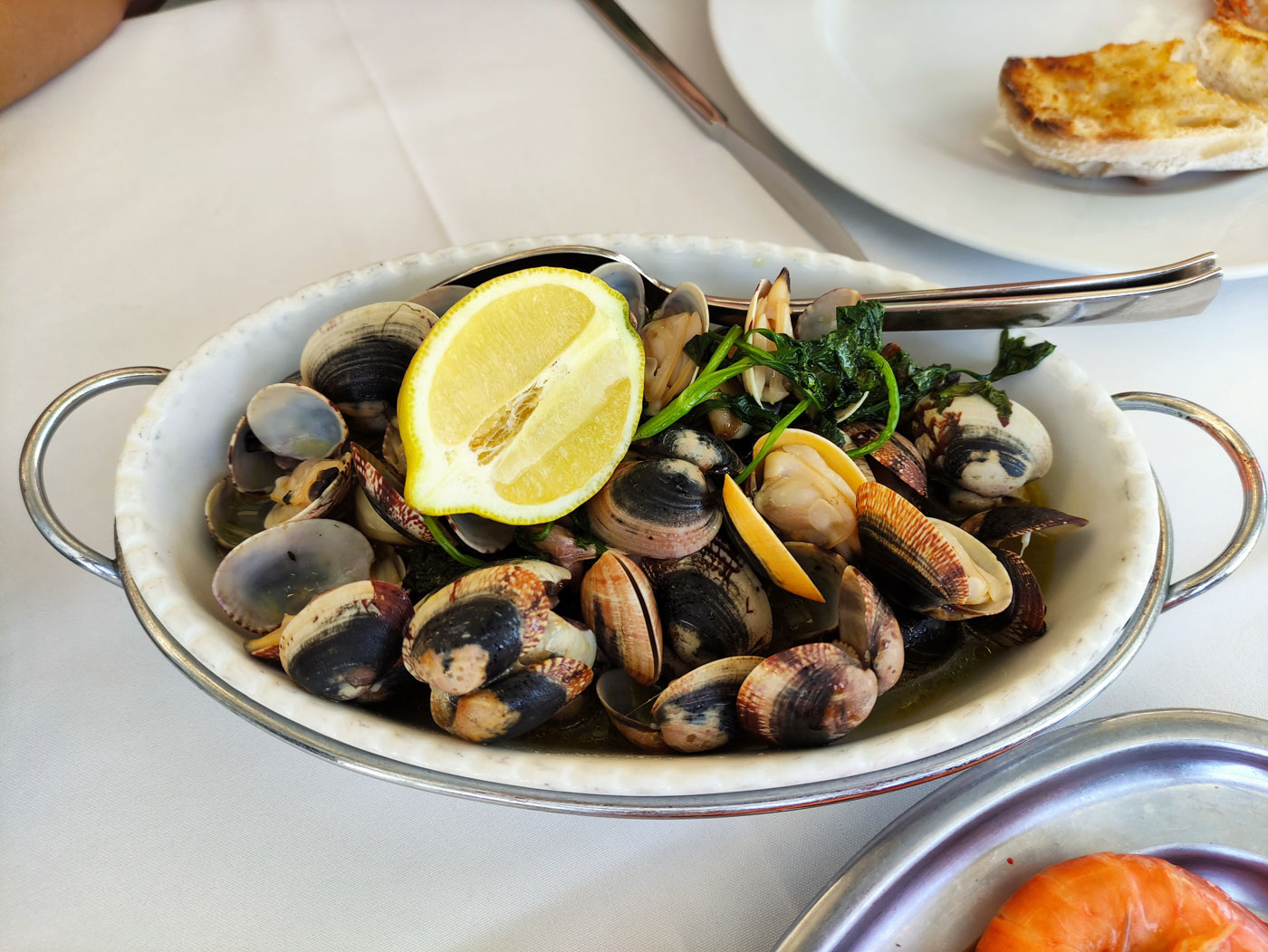 Clams at a traditional Portuguese restaurant Portugal The Simple Life