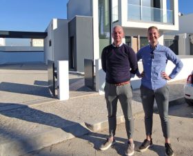 Immo Portugal dutch client Mark Mulder with his son at tyhjeir new build villa in Pataias in Silver Coast Portugal