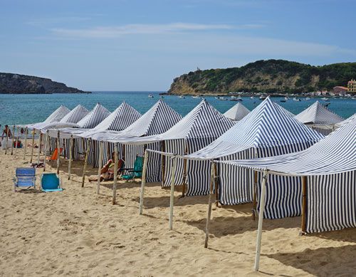 Traditional stripped beach tents in Sao Martinho do Porto - Portugal 