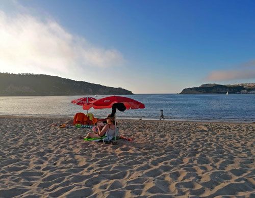 Sunset on the beach of Sao Martinho do Porto in Portugal 