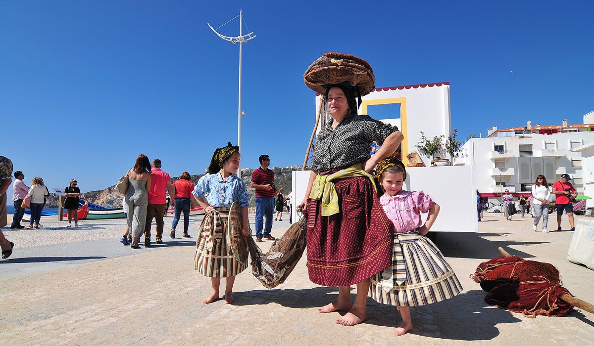Traditional seven skirts of the women of Nazare beach in Portugal