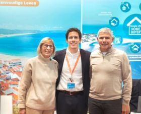 Property consultant Jordy Motta with an elderly couple at the Second Home property show